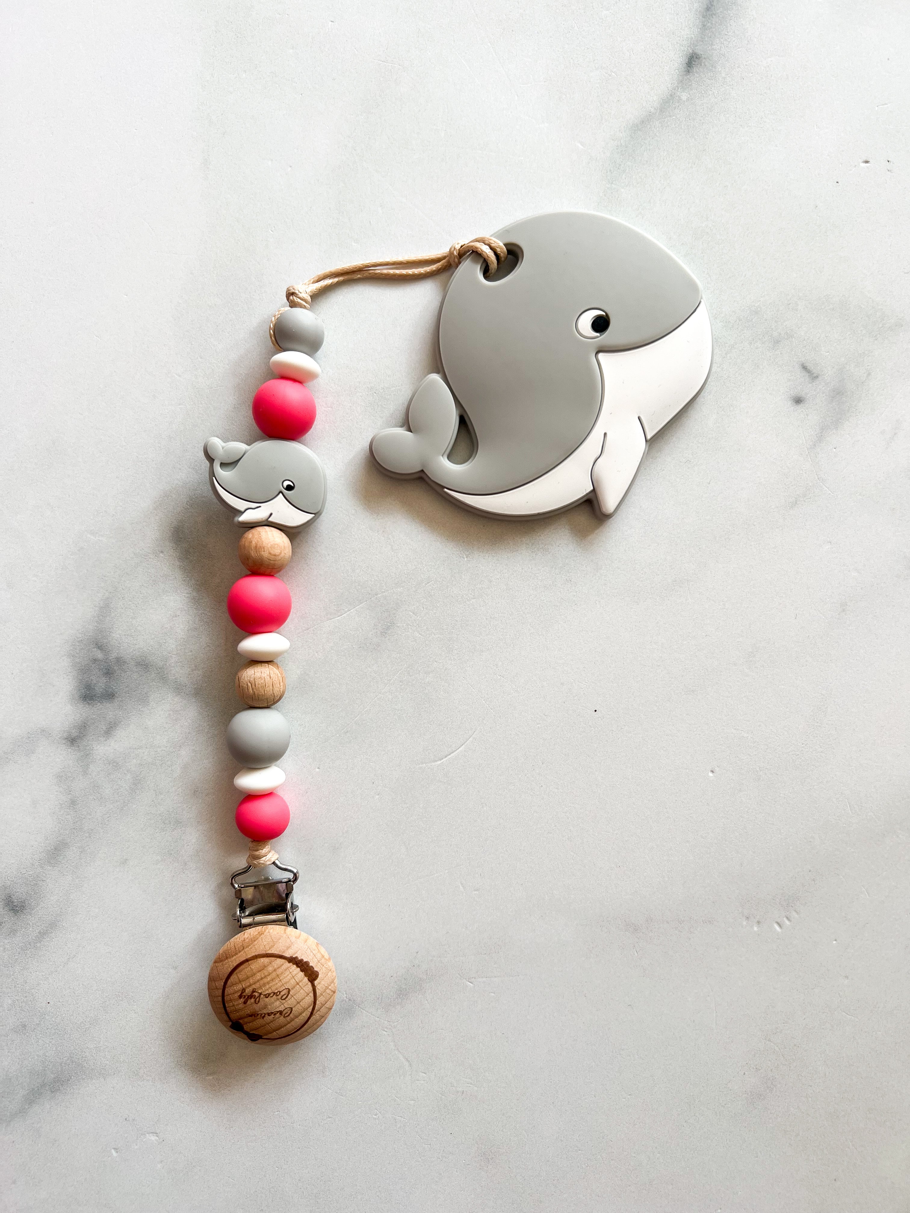 Duo attache suce et jouet de dentition baleine rose