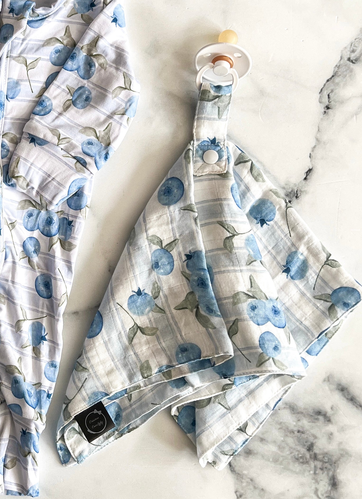 Attache-suce bleuets en mousseline de bambou