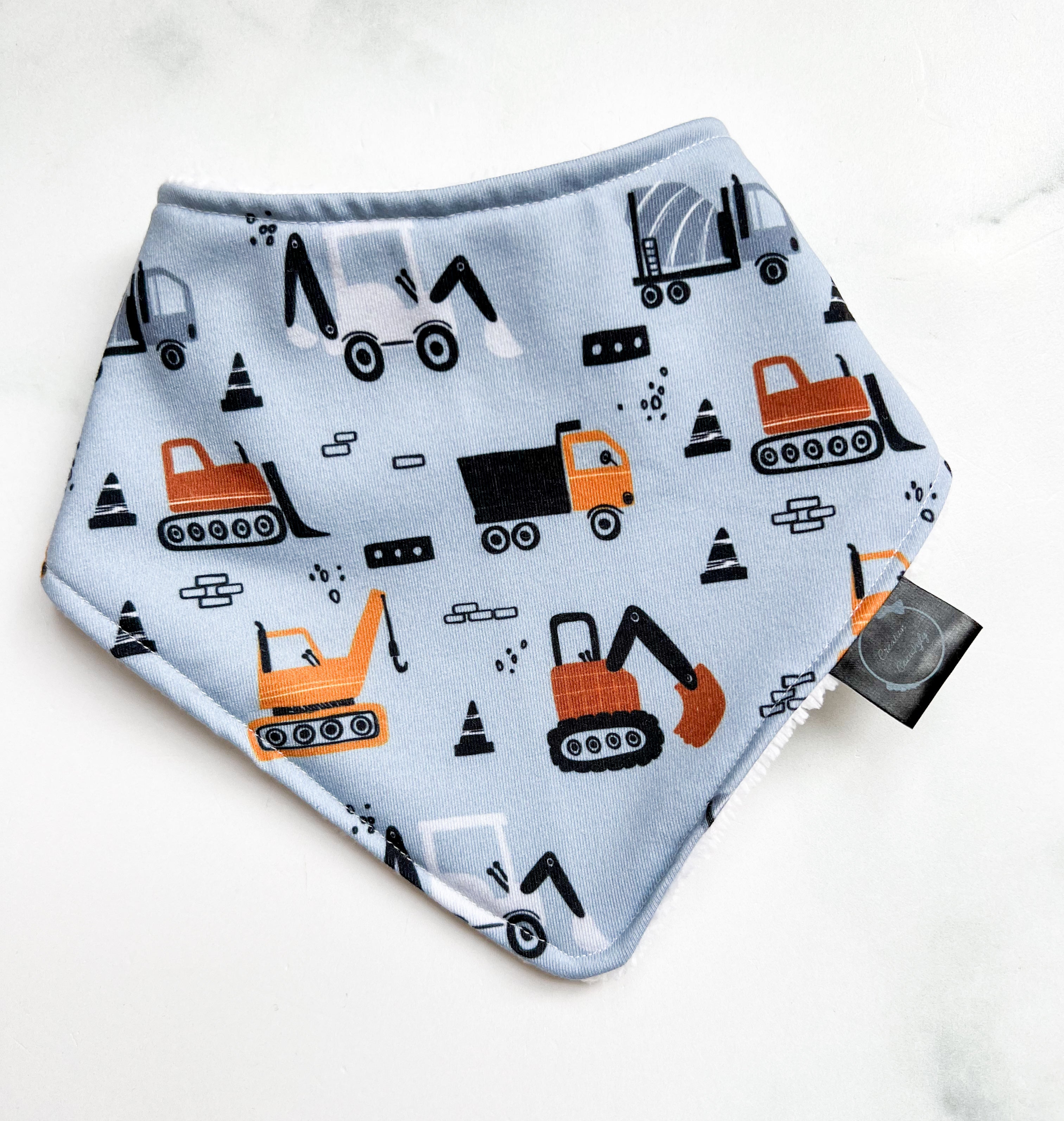 Bavoir les camions de construction