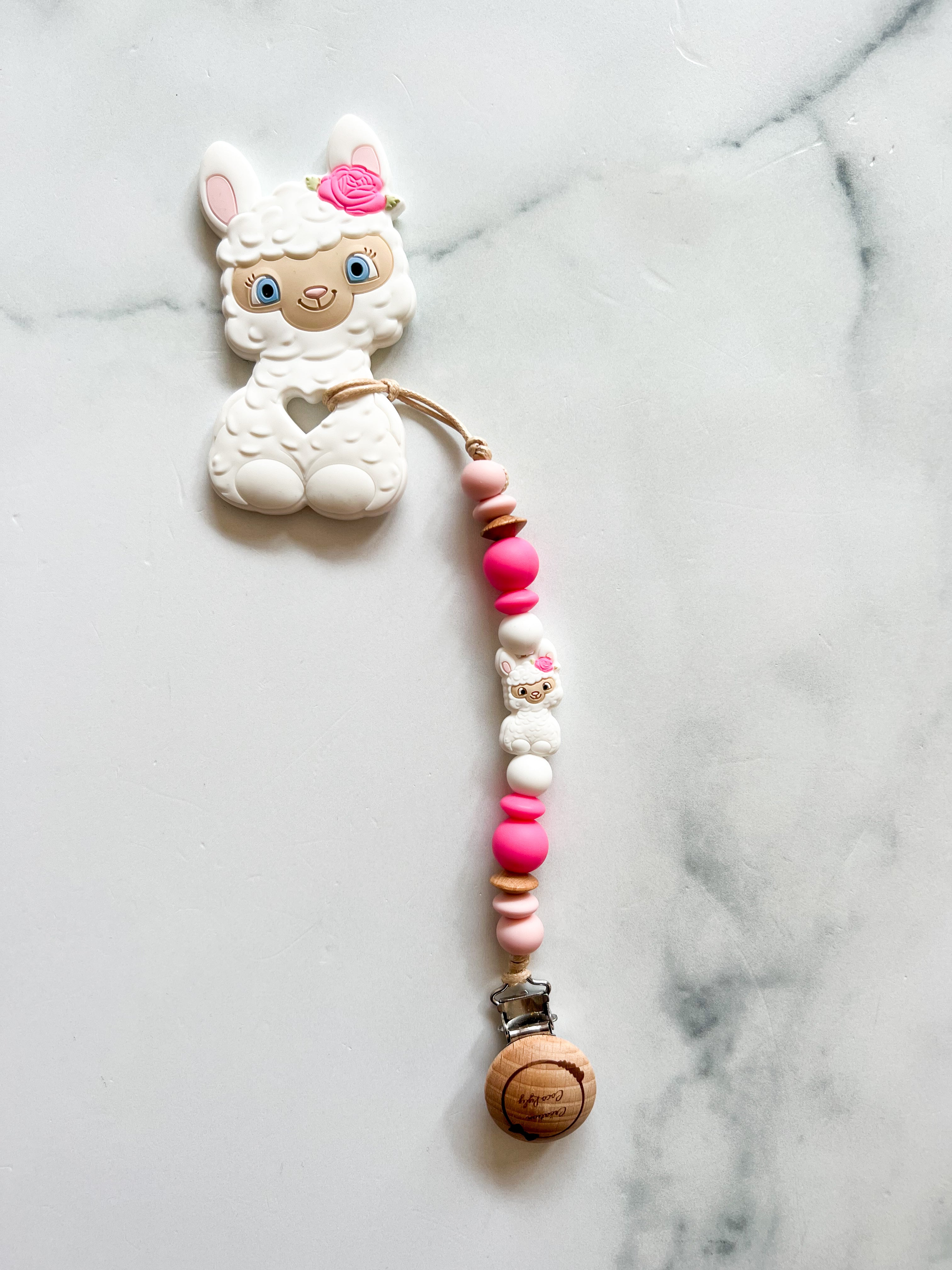 Duo attache suce et jouet de dentition lama fleur