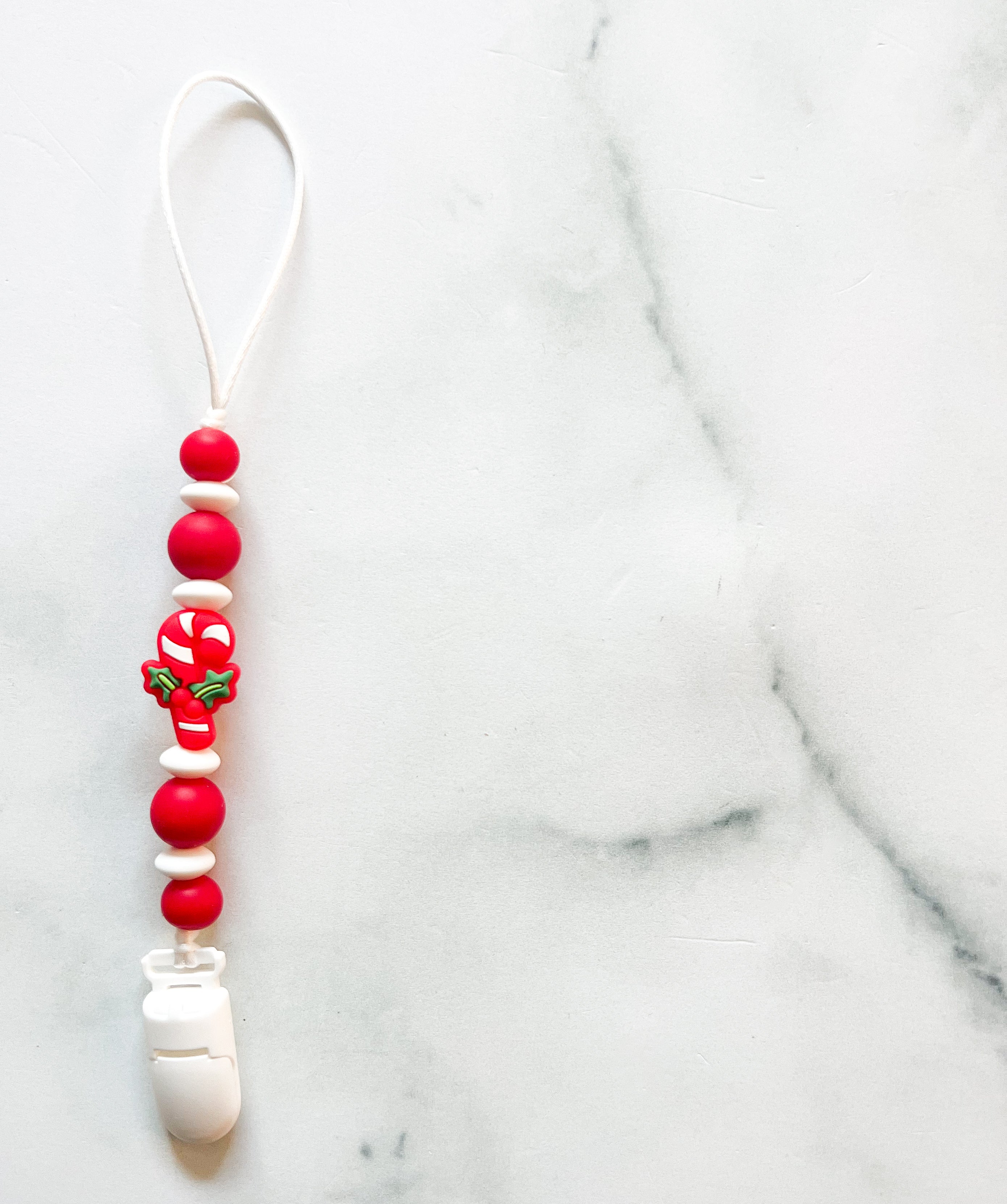 Attache-suce canne de bonbon