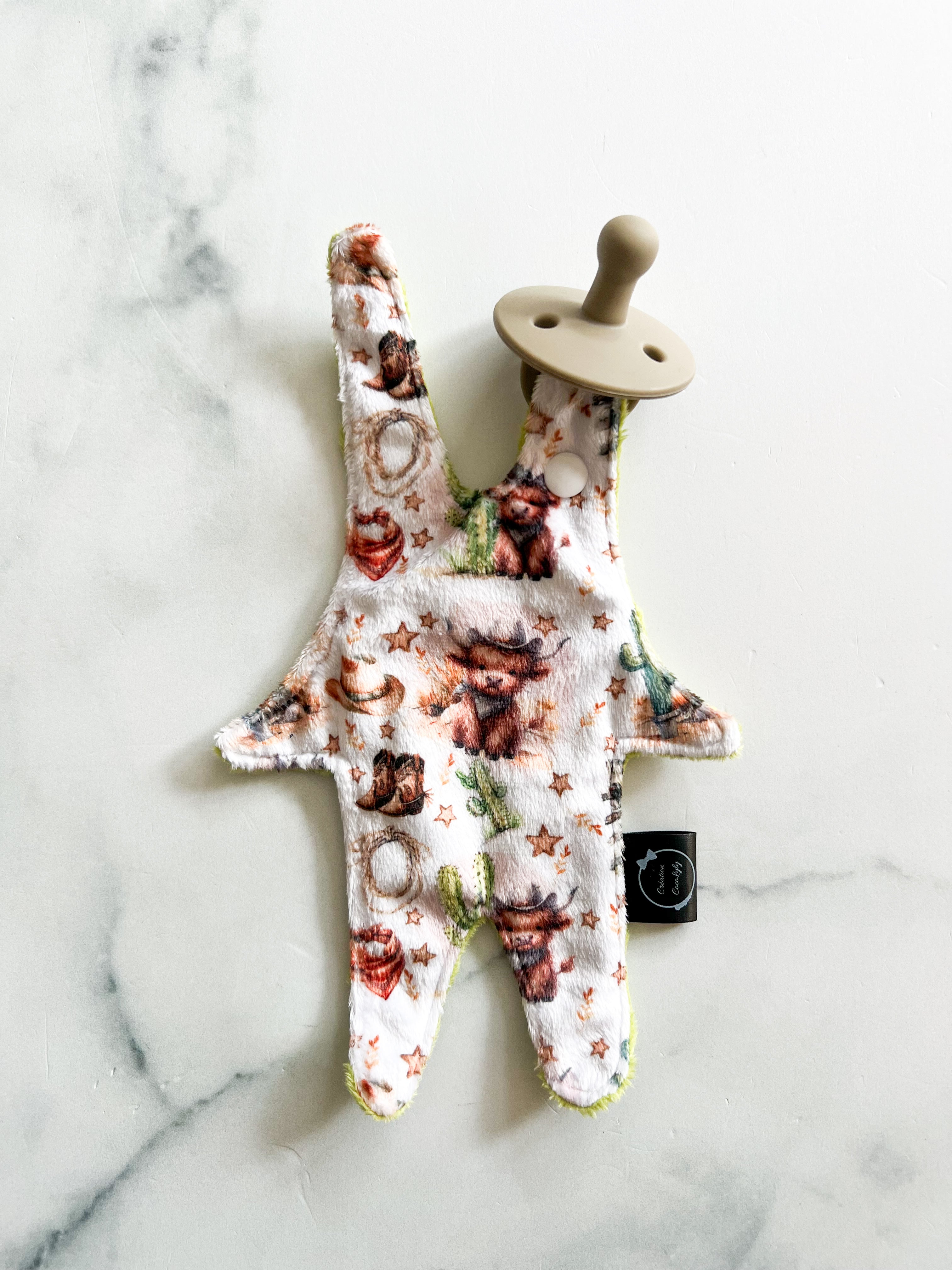 Attache suce petit bonhomme vache highland cowboy