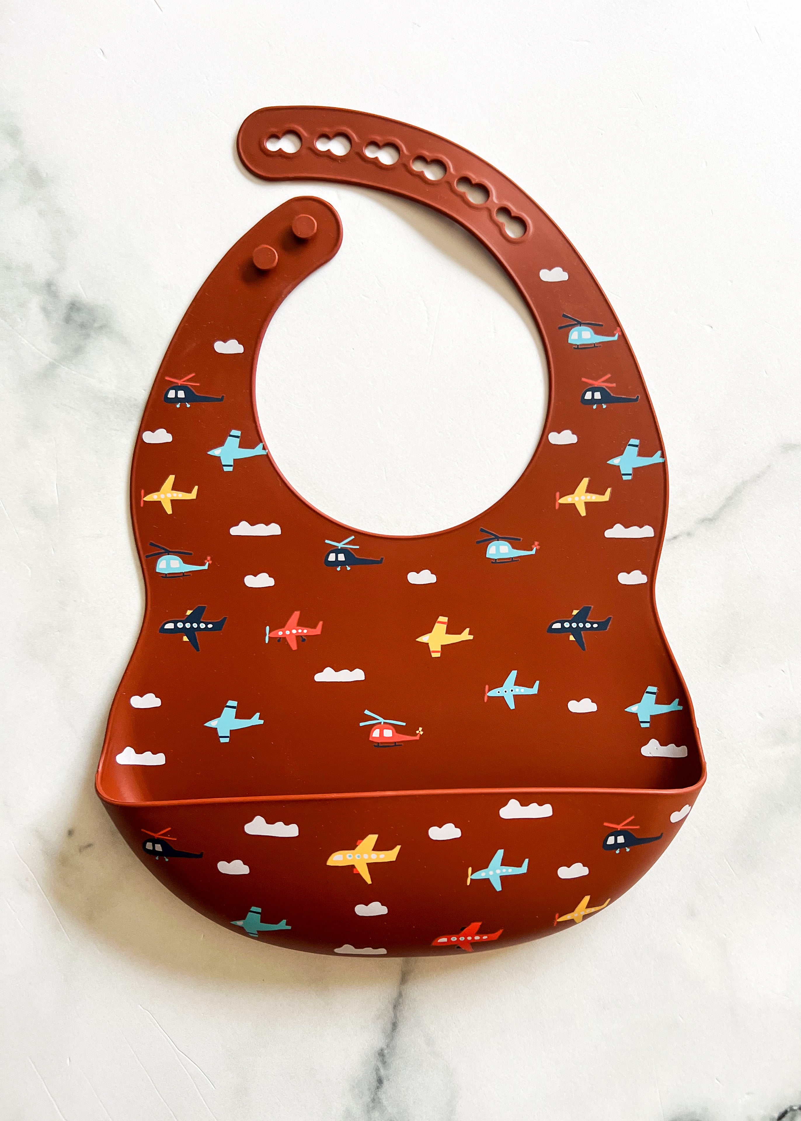 Bavette en silicone avec motifs avions