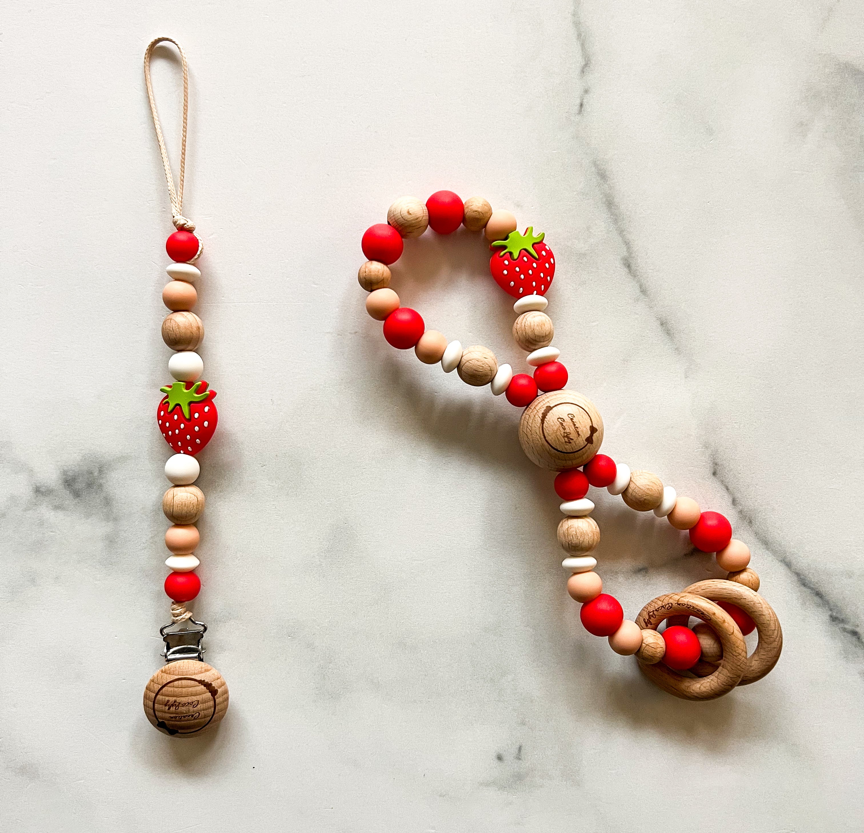 Duo attache-suce et hochet infini fraise (voir description)