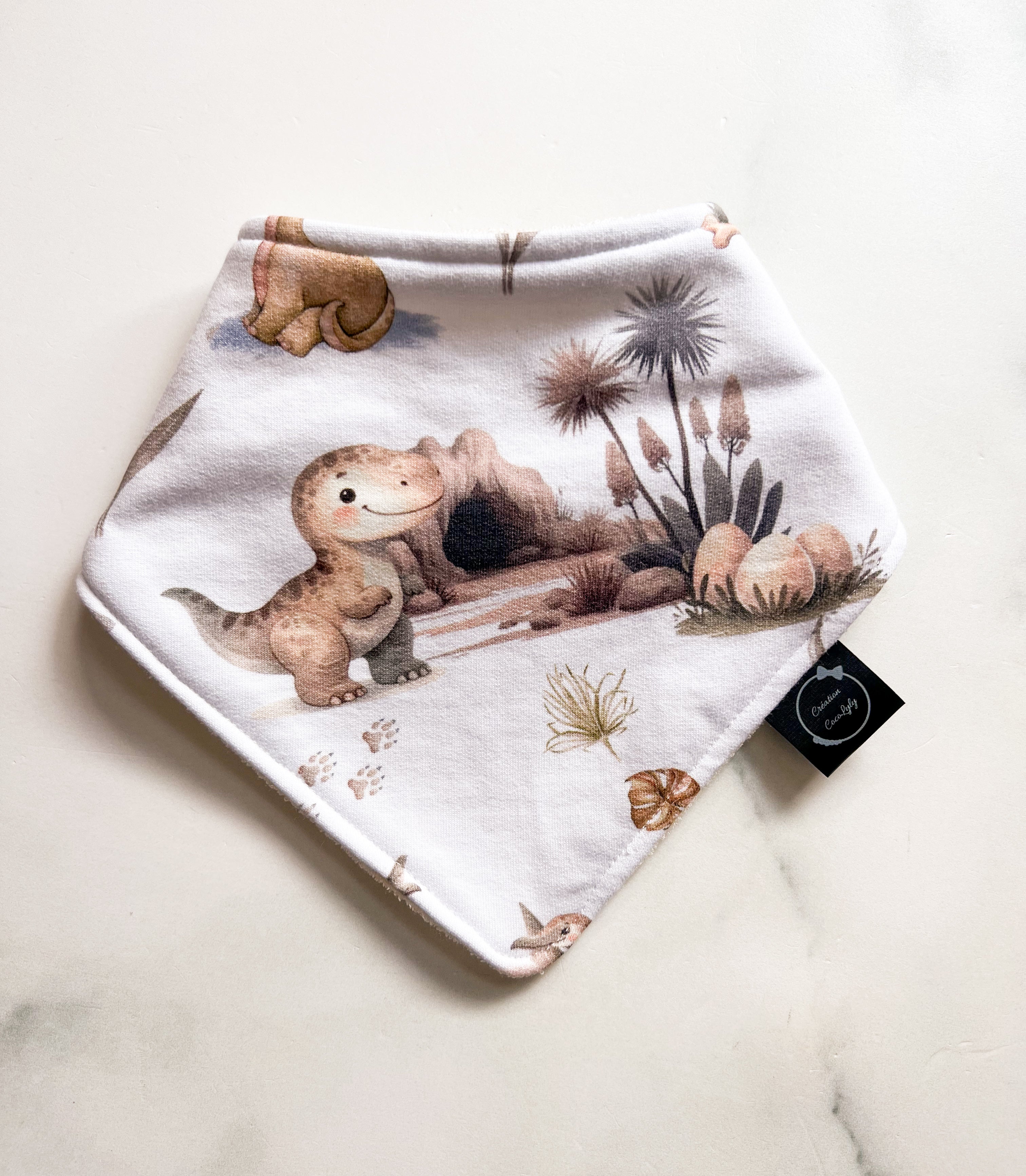 Bavoir dinosaures ajustable