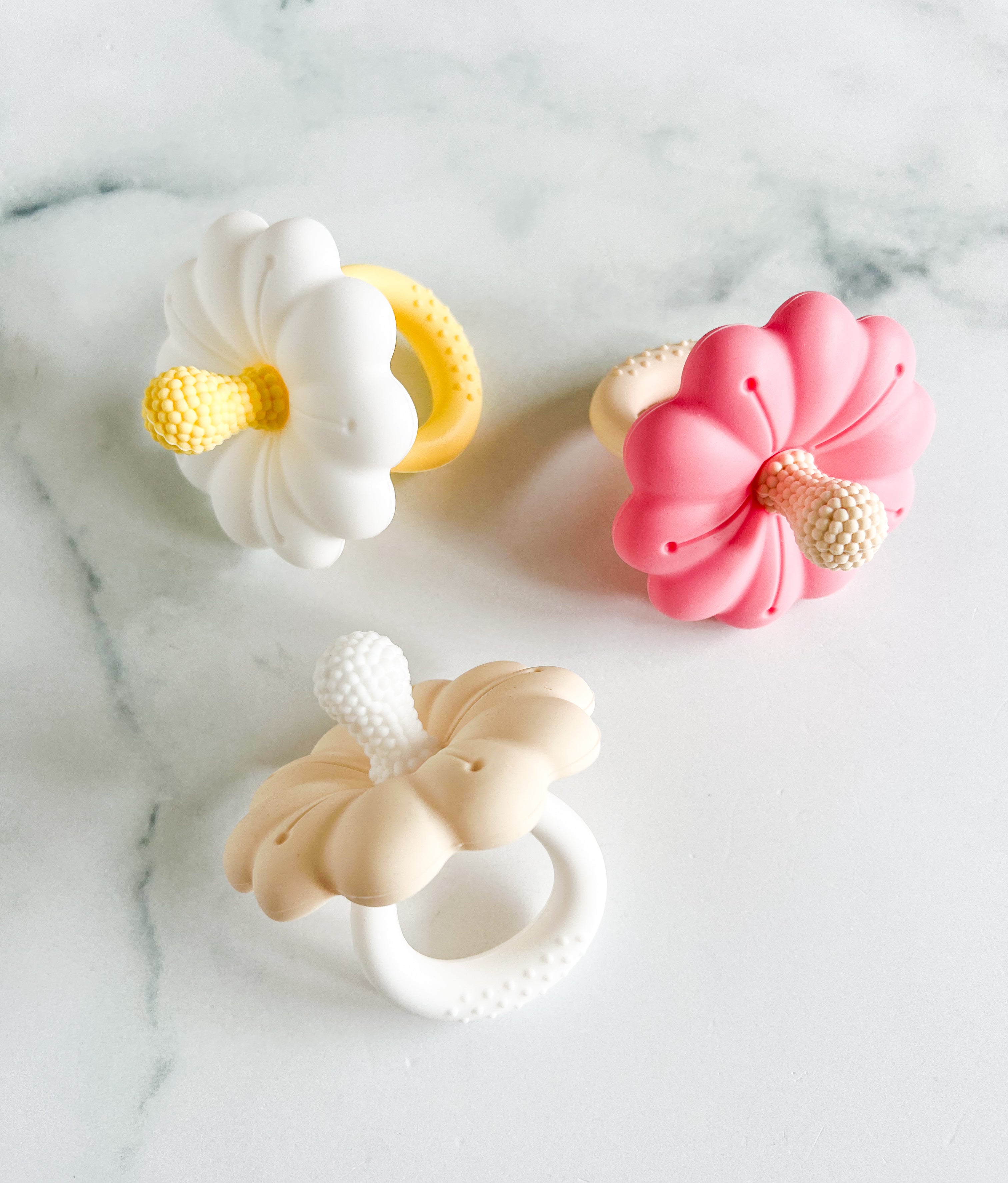 Suce de dentition fleur