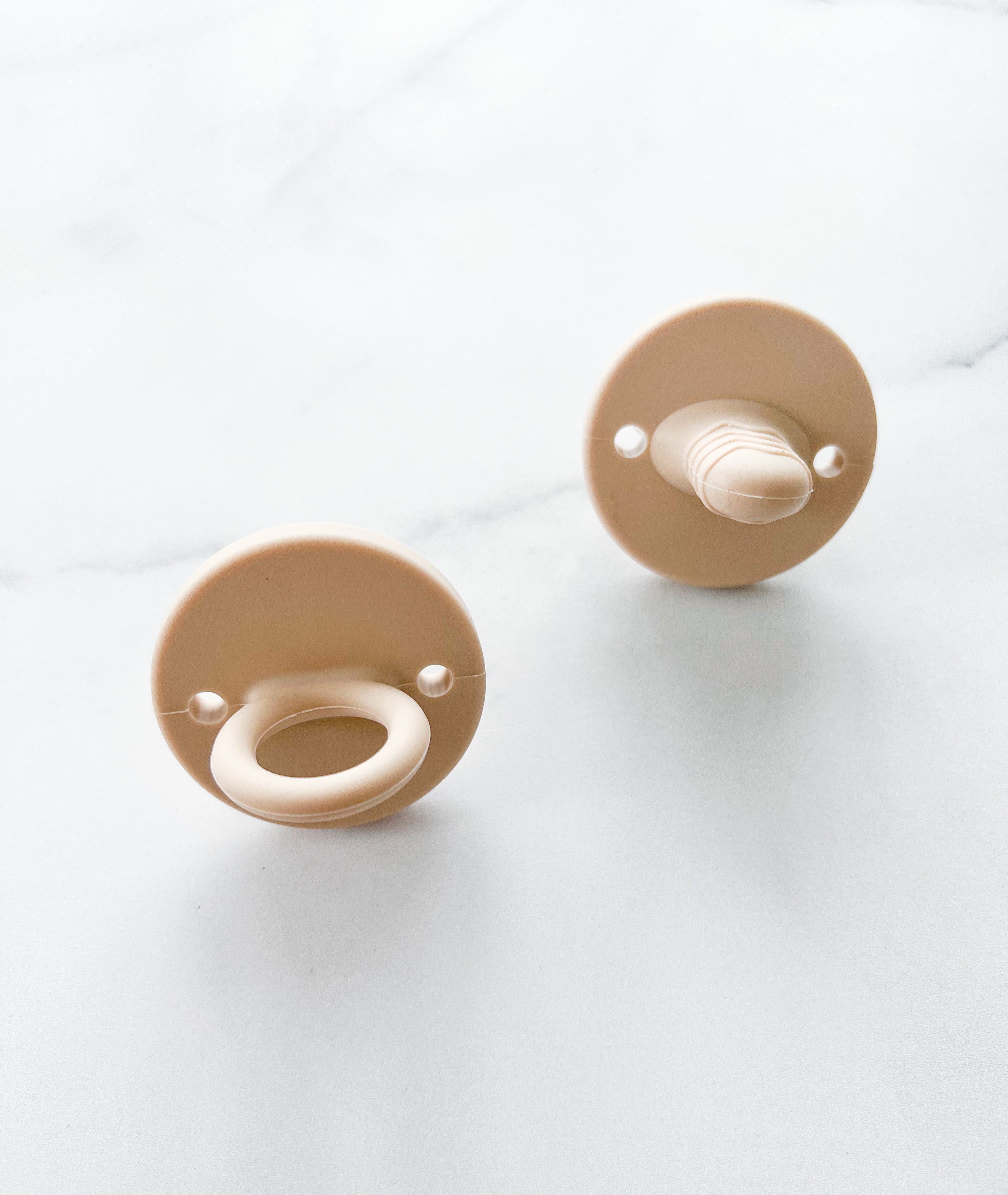 Suce de dentition beige