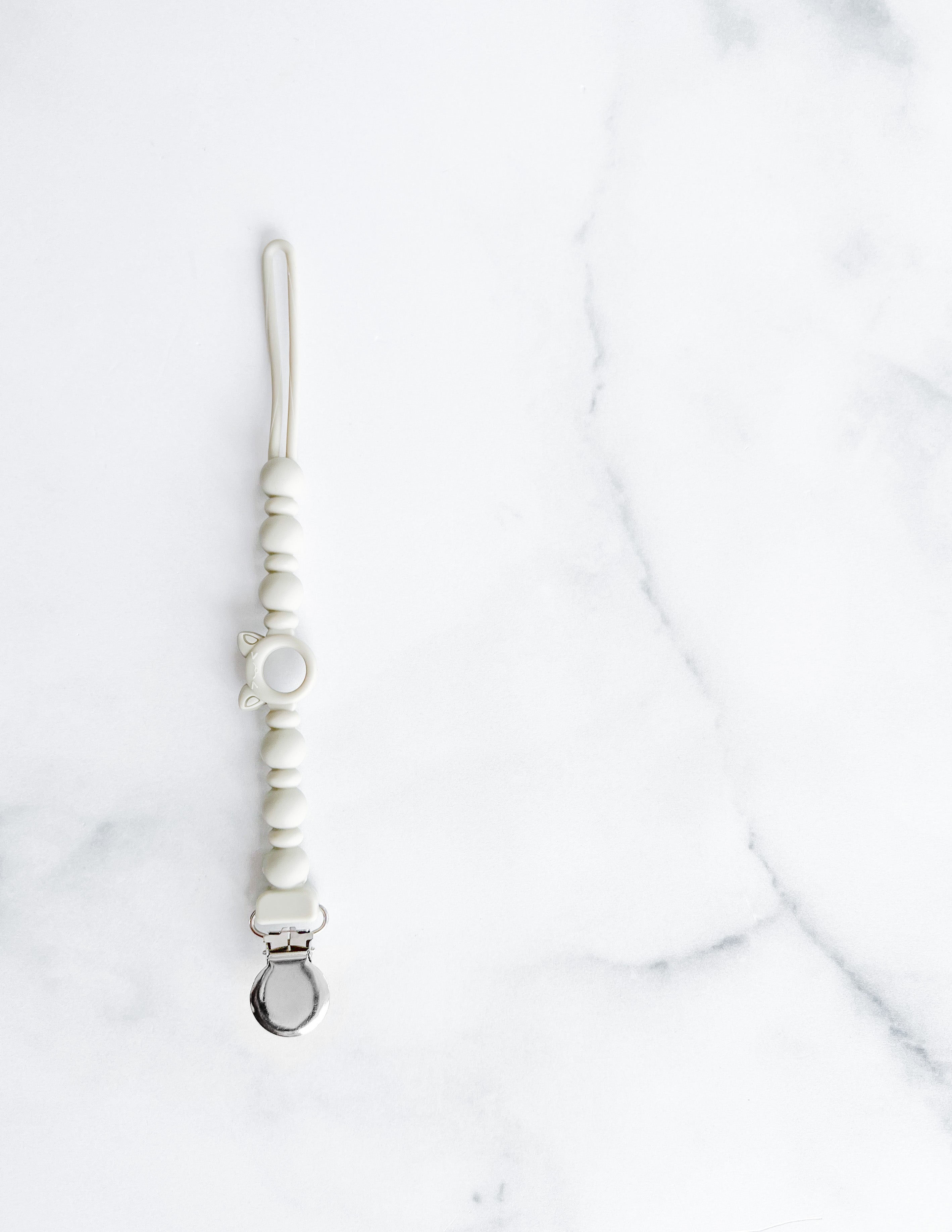 Attache suce tout en silicone style billes gris