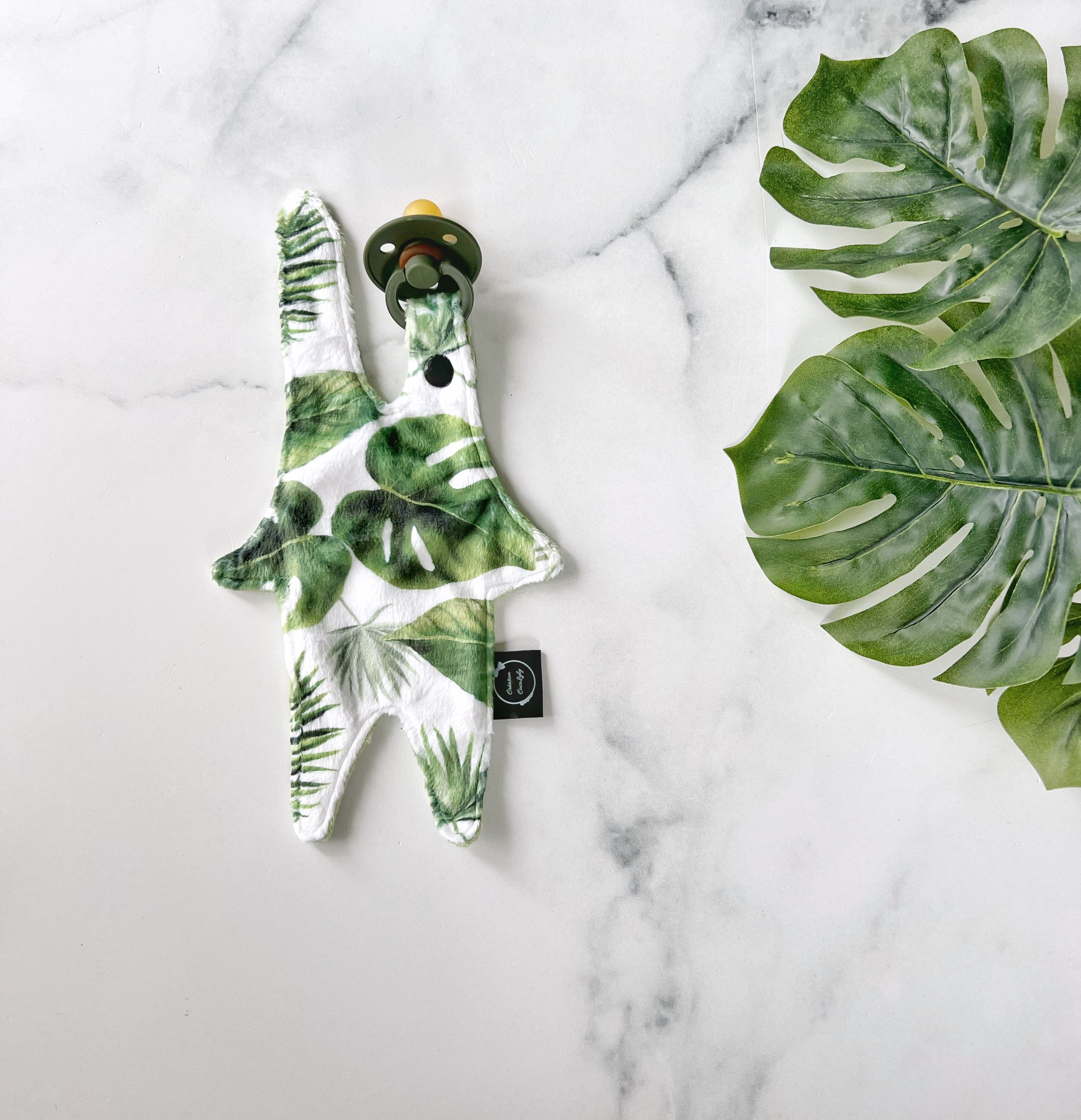 Attache suce petit bonhomme monstera