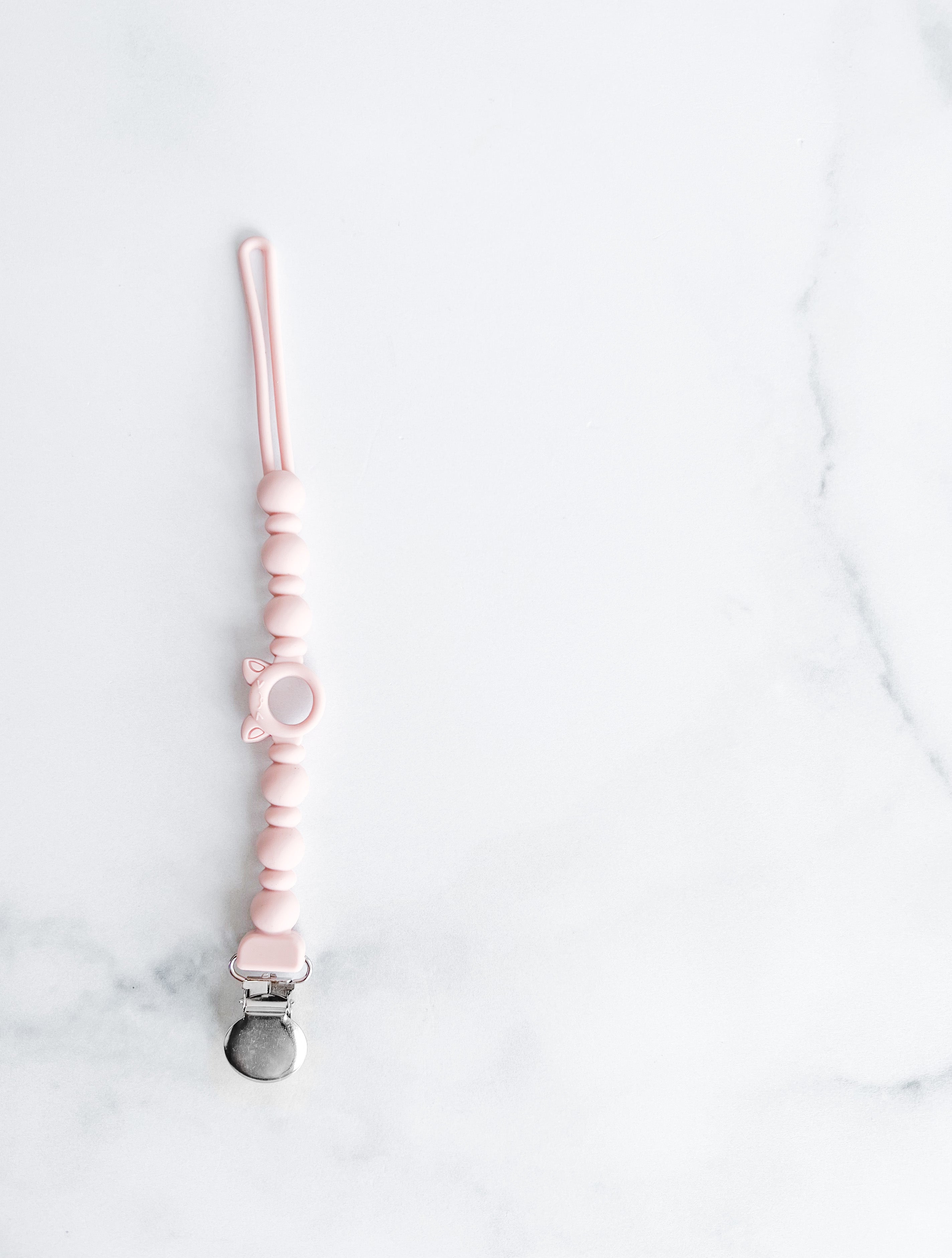 Attache suce tout en silicone style billes vieux rose