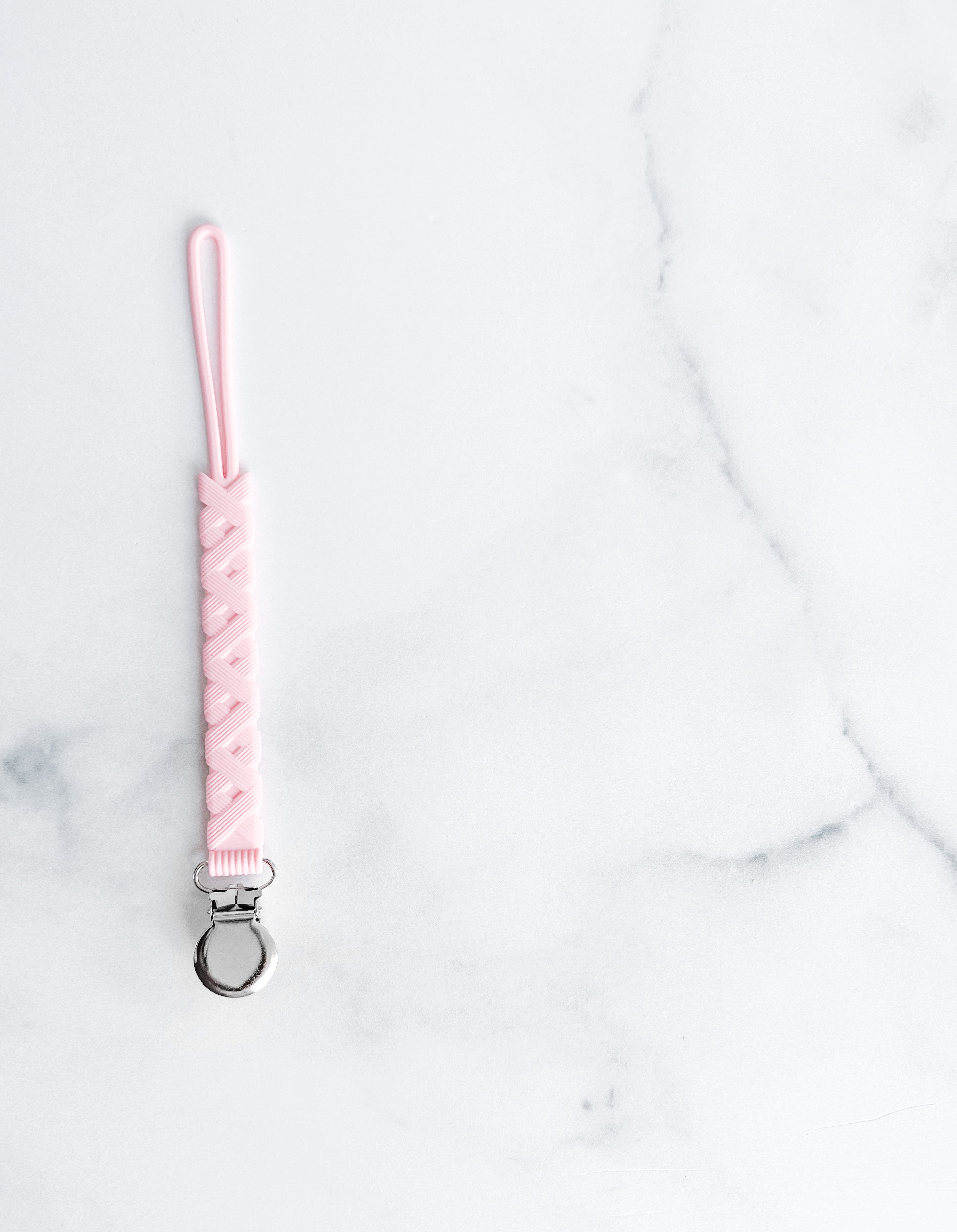 Attache suce tout en silicone style macramé rose